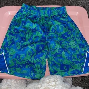Blue and green Nike shorts